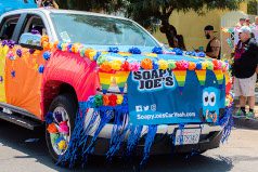 Soapy Joe’s decked-out Pride truck with rainbow balloons and rainbow wrap.